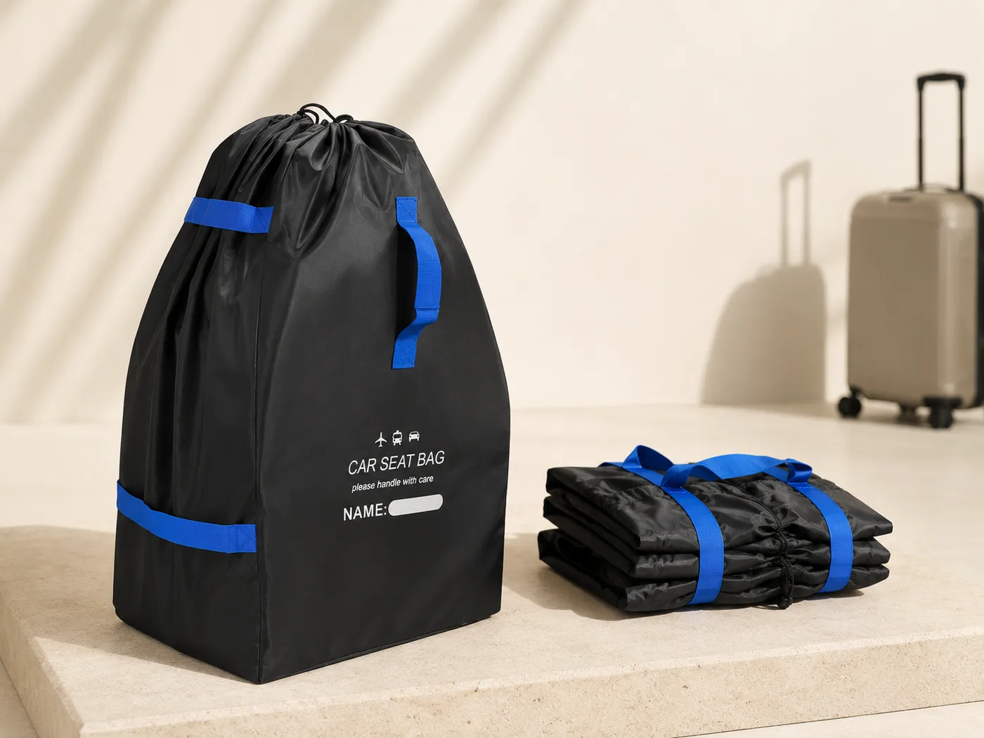 Car seat travel bag standing upright beside the same bag folded flat into a compact stack